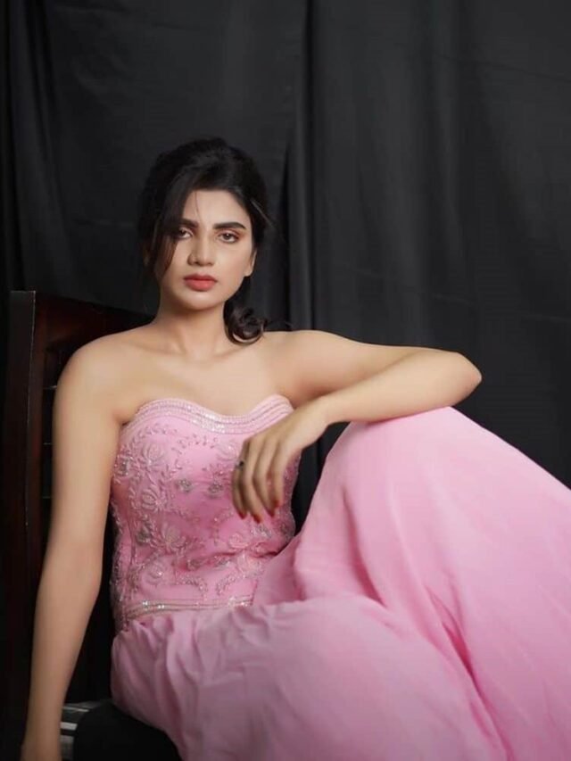 Varsha Provocative Poses in Light Pink Outfit