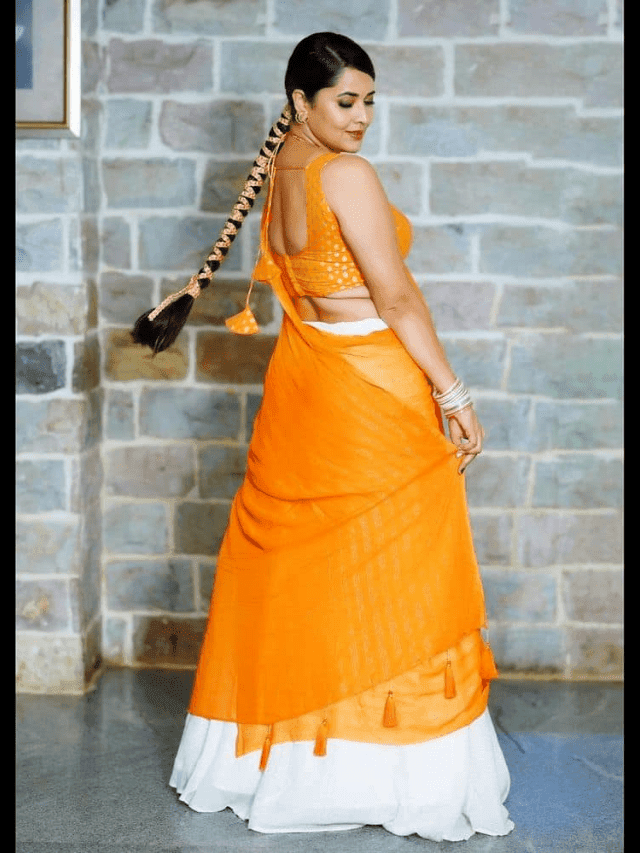 Anasuya Bhardwaj Hot Surprise in Orange Dress