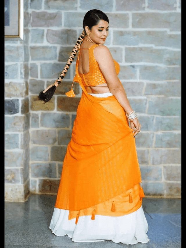 Anasuya Bhardwaj Hot Surprise in Orange Dress