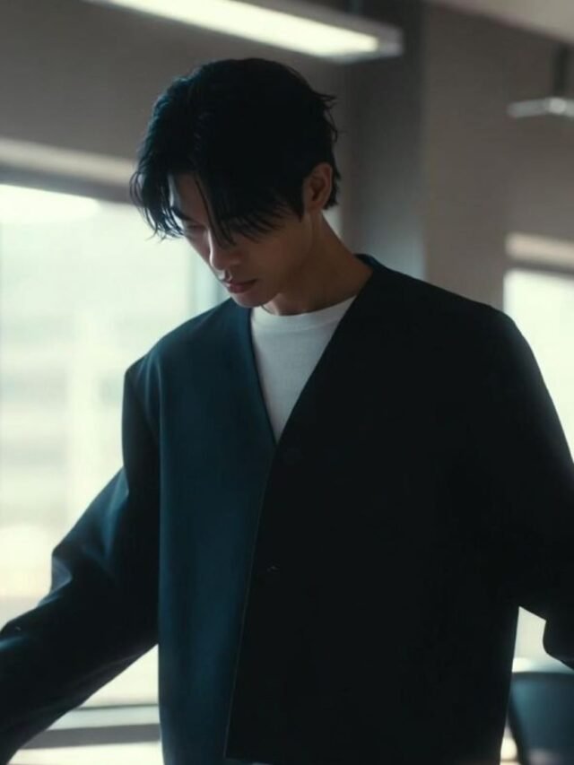 Person standing with crossed arms showing defensive body language